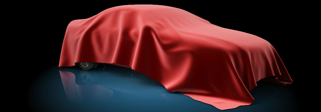 Car covered in red cloth