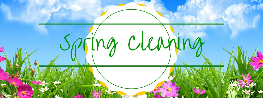 Spring cleaning written over flowers and grass