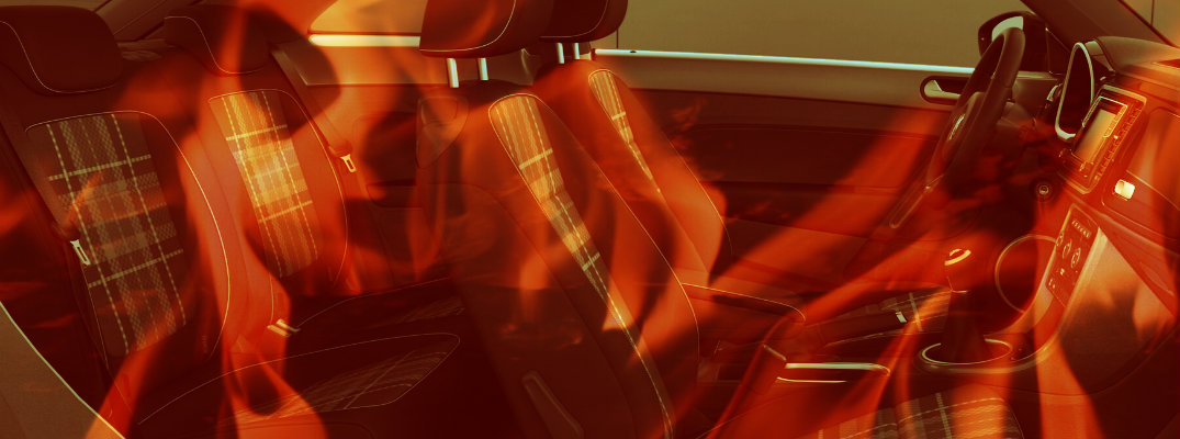 Car interior with flames to illustrate heat